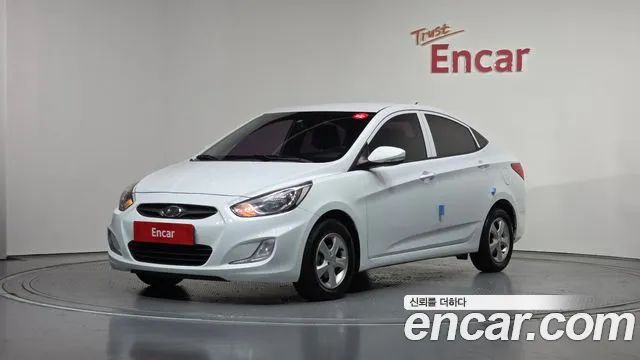 Hyundai Accent 2013 — фото 1