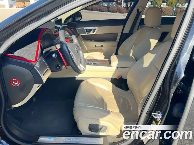 Jaguar XF 2014 — фото 10