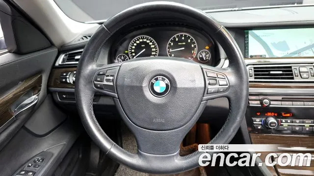 BMW 7-Series 2011 — фото 13