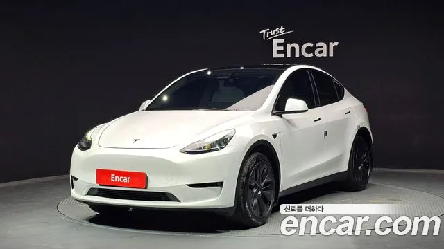 Tesla Model Y 2024 — фото 1