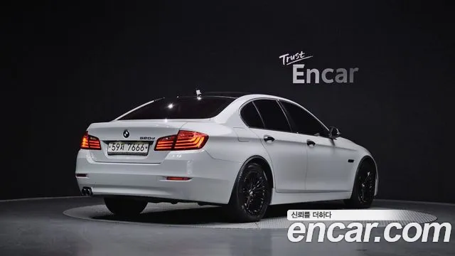 BMW 5-Series 2014 — фото 1