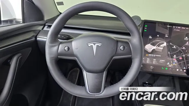 Tesla Model Y 2024 — фото 17