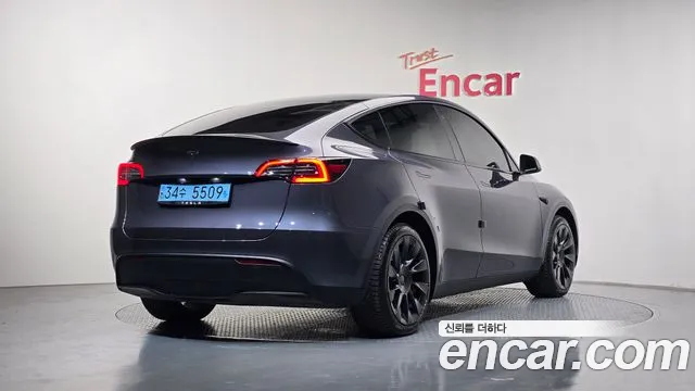 Tesla Model Y 2023 — фото 1
