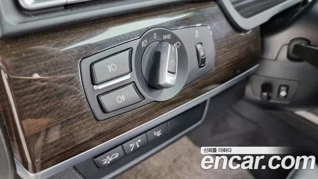 BMW 7-Series 2011 — фото 14