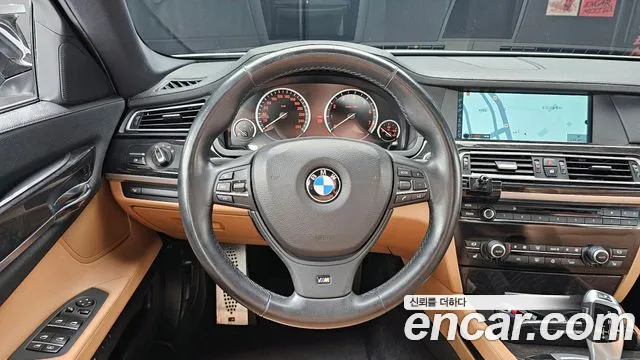 BMW 7-Series 2010 — фото 13