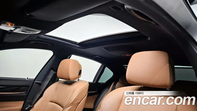 BMW 7-Series 2010 — фото 19