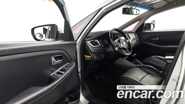 Kia Carens 2015 — фото 11