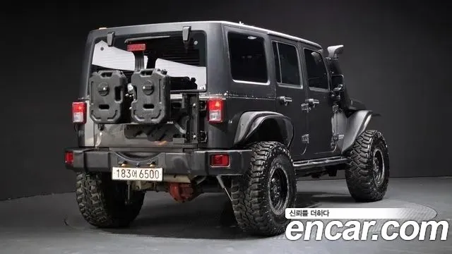 Jeep Wrangler 2016 — фото 2