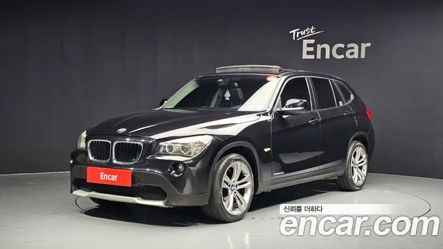 BMW X1 2011 — фото 1
