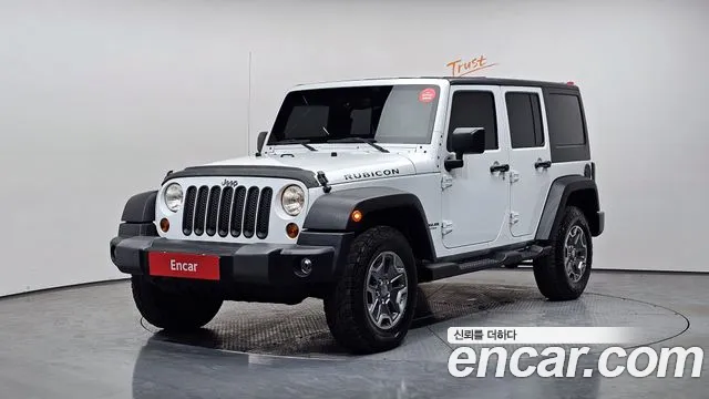 Jeep Wrangler 2013 — фото 1