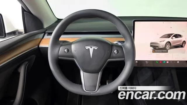 Tesla Model Y 2024 — фото 18