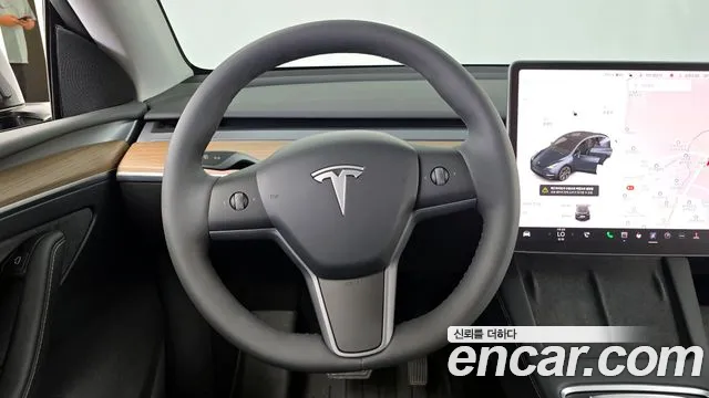 Tesla Model Y 2025 — фото 19