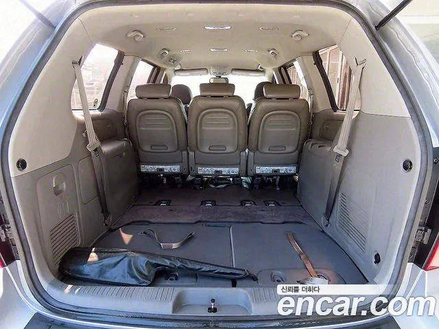 Kia Canival 2011 — фото 18