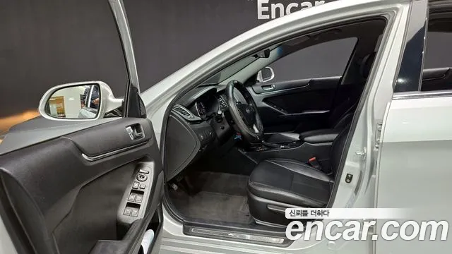 Kia K7 2010 — фото 11