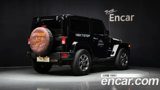 Jeep Wrangler 2011 — фото 2