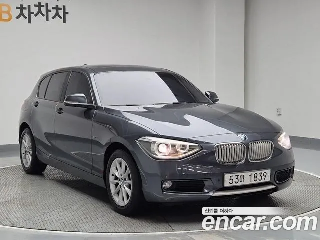 BMW 1-Series 2014 — фото 1