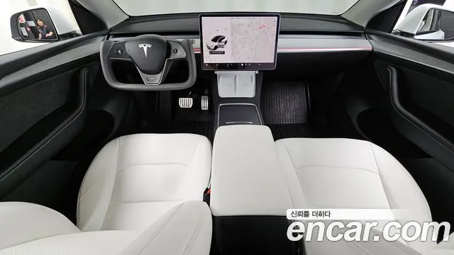 Tesla Model Y 2024 — фото 10