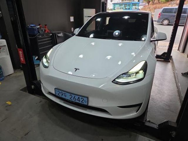 Tesla Model Y 2023 — фото осмотра 1