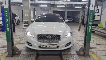 Jaguar XJ 2015 — фото осмотра 1