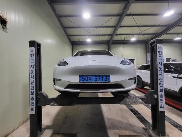 Tesla Model Y 2021 — фото осмотра 1