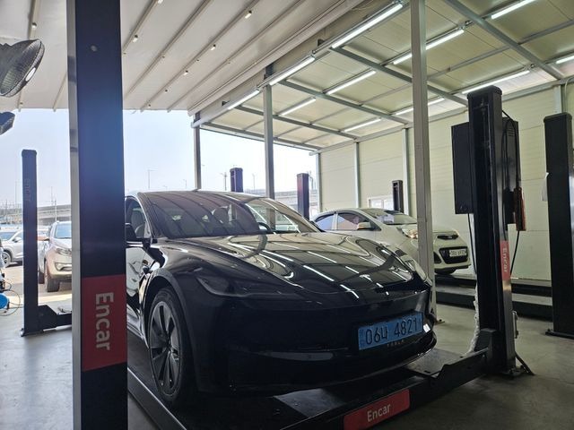 Tesla Model 3 2024 — фото осмотра 1