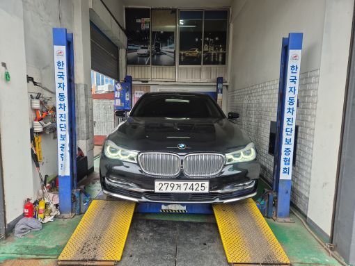 BMW 7-Series 2016 — фото осмотра 1