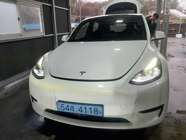 Tesla Model Y 2024 — фото осмотра 1