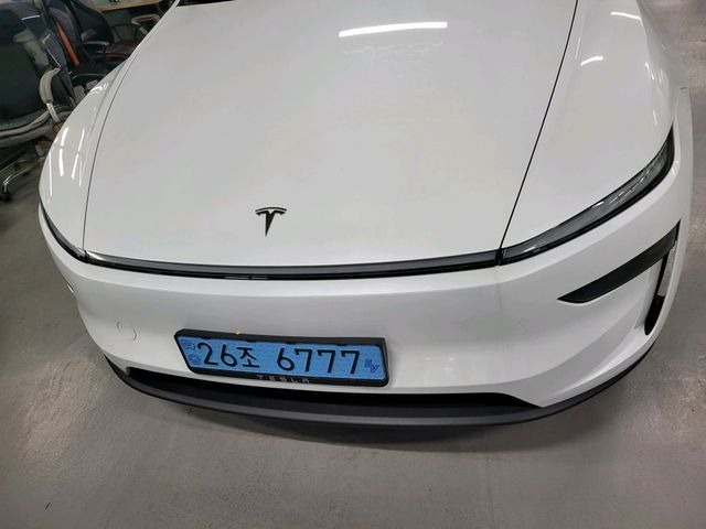 Tesla Model Y 2025 — фото осмотра 1