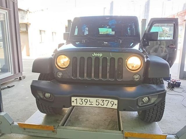 Jeep Wrangler 2016 — фото осмотра 1