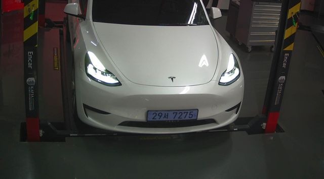 Tesla Model Y 2024 — фото осмотра 1