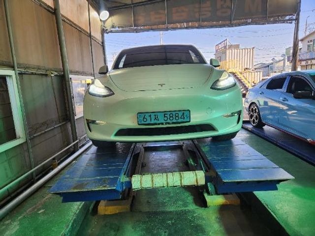 Tesla Model Y 2021 — фото осмотра 1
